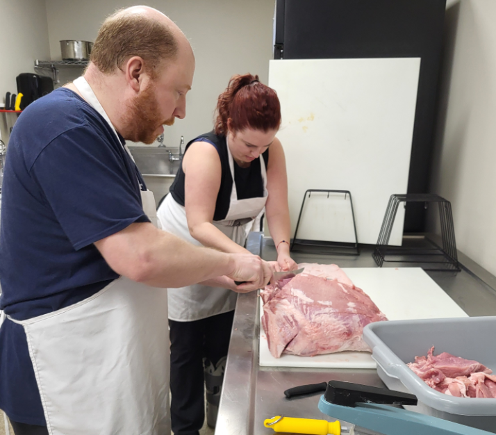 Preparing meat to be ground 